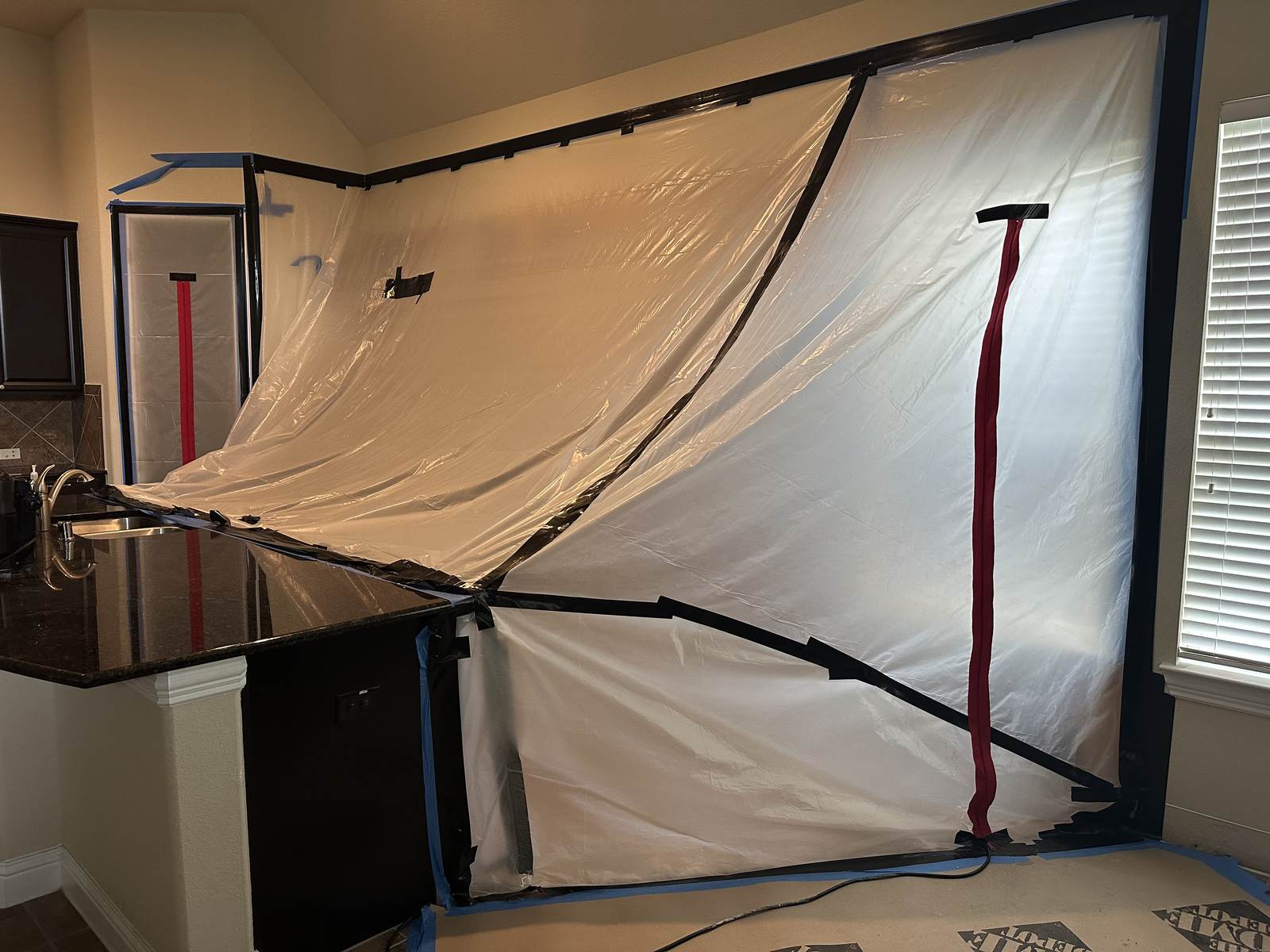 Kitchen during rebuild with mold containment
